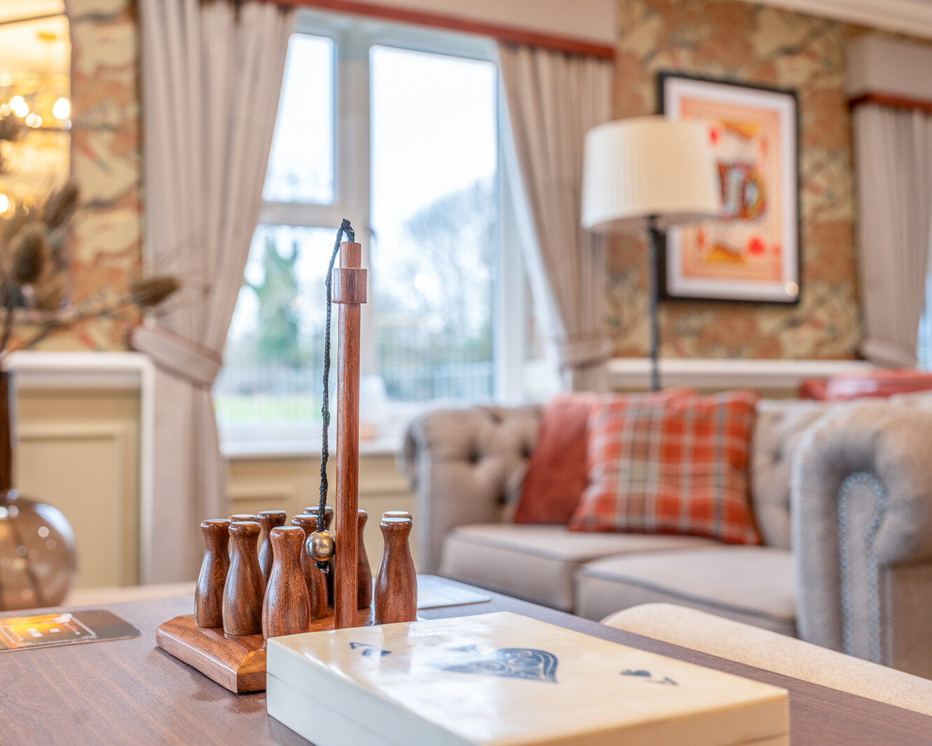 Comfortable residents' lounge with seating and natural light