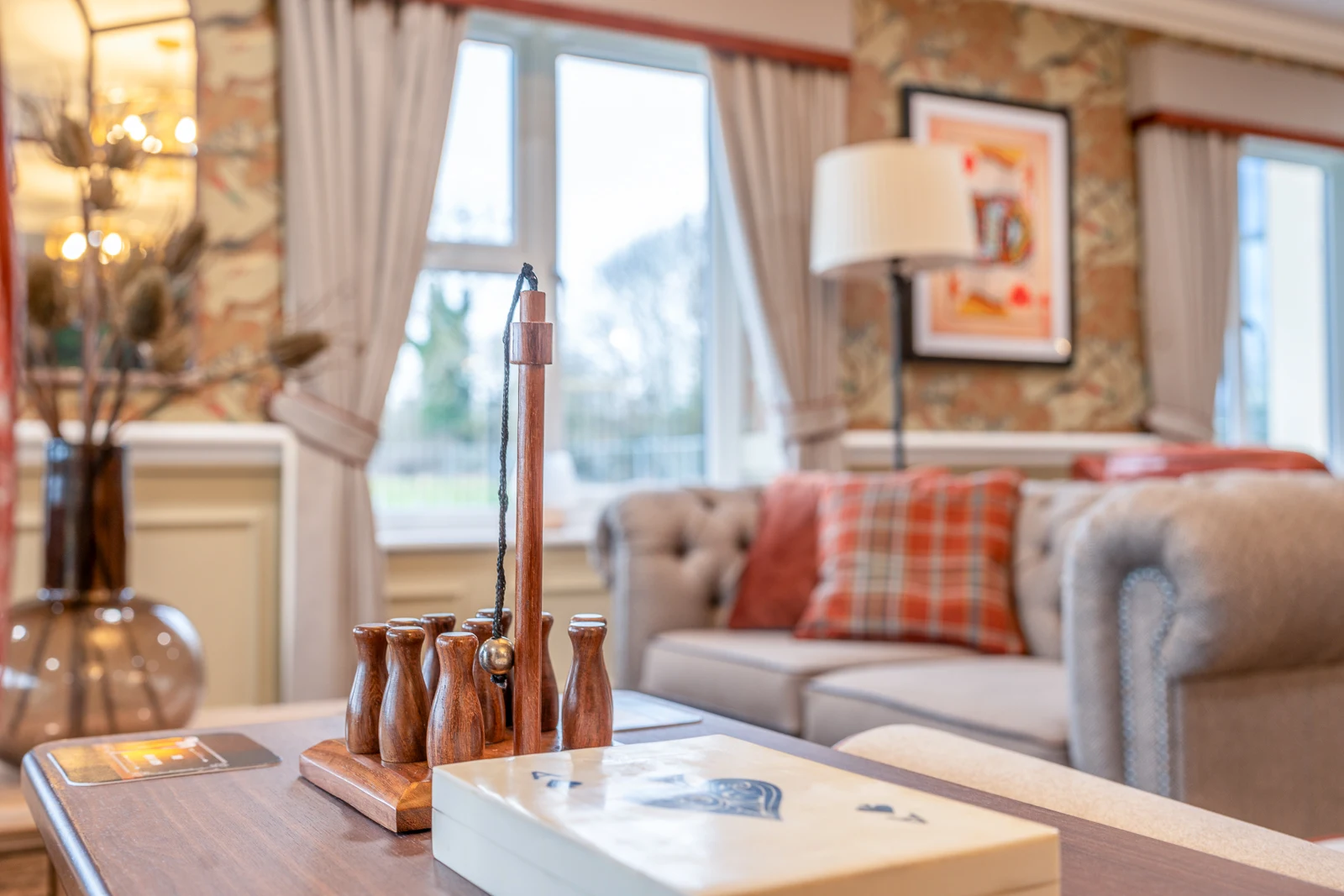 Comfortable residents' lounge with seating and natural light