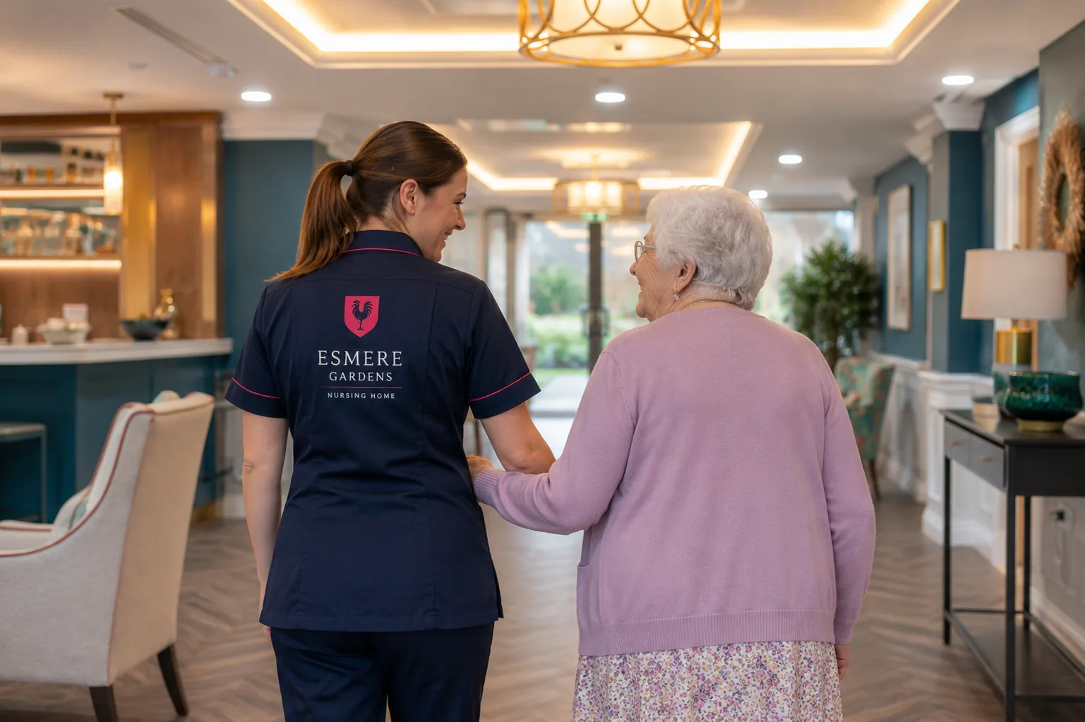An Esmere Gardens carer walking alongside a resident with calm personal support